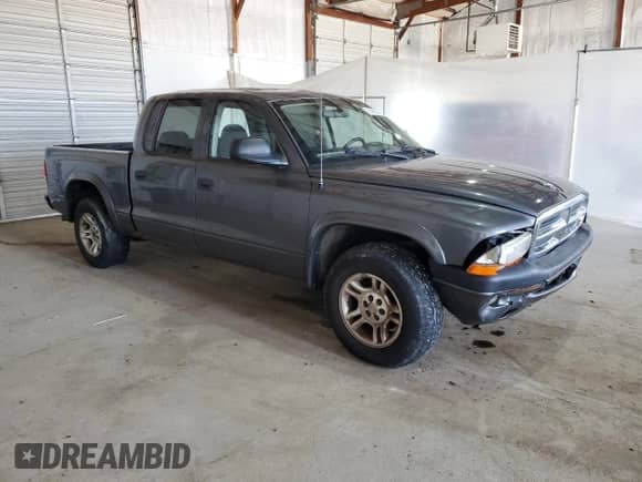 2004 Dodge Dakota Sport z VIN 1D7HL38N54S536938, wystawiony jako Copart lot #52455345 z przebiegiem 157 791 mil mil oraz Szkoda całkowita • Salvage title. Historia ofert i sprzedaży dostępna na DreamBid. Obrazek 4.