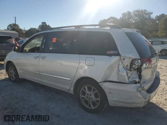 2006 Toyota Sienna XLE Limited z VIN 5TDZA22C16S411890, wystawiony jako Copart lot #82412005 z przebiegiem 187 414 mil mil oraz Szkoda całkowita • Salvage title. Historia ofert i sprzedaży dostępna na DreamBid. Obrazek 2.