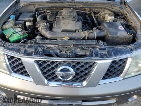 2006 Nissan Pathfinder LE z VIN 5N1AR18W06C610895, wystawiony jako Copart lot #90919905 z przebiegiem 232 605 mil mil oraz Czysty tytuł • Clean title. Historia ofert i sprzedaży dostępna na DreamBid. Obrazek 12.