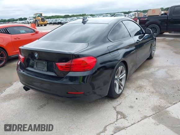 2014 BMW 4 Series 428i with VIN WBA3N7C58EF719495, listed as a IAAI auction lot 42490625 with 179,410 mi miles and . Bid and sale history available at DreamBid. Image 4.