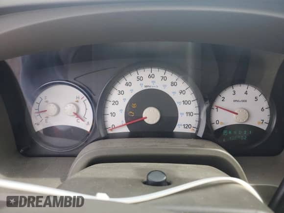 2010 Dodge Dakota Bighorn/Lonestar z VIN 1D7CE3GK3AS263831, wystawiony jako Copart lot #61444305 z przebiegiem 100 902 mil mil oraz Szkoda całkowita • Salvage title. Historia ofert i sprzedaży dostępna na DreamBid. Obrazek 9.