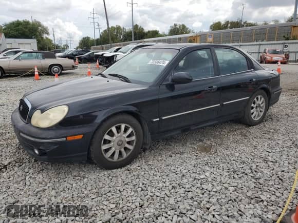 2002 Hyundai Sonata GLS with VIN KMHWF35H52A615774, listed as a Copart auction lot 72336474 with 156,588 mi miles and Salvage title. Bid and sale history available at DreamBid. Image 1.