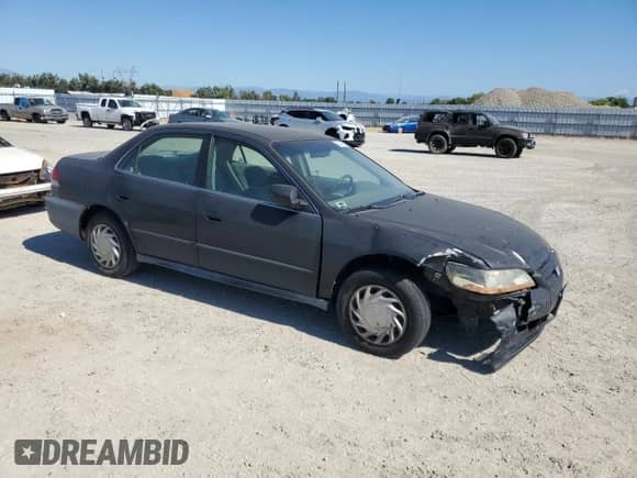 2002 Honda Accord LX с VIN 1HGCG66502A001274, выставлен на аукционе Copart как лот 62647595 с пробегом 197 441 миль миль и Списание • Salvage title. История ставок и продаж доступна на DreamBid. Изображение 4.