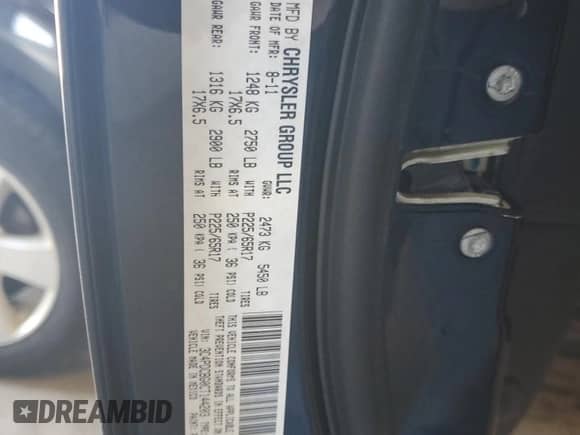 2012 Dodge Journey SXT with VIN 3C4PDCBG0CT144203, listed as a Copart auction lot 70664645 with 135,455 mi miles and Salvage title. Bid and sale history available at DreamBid. Image 13.