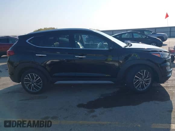 2021 Hyundai Tucson SEL with VIN KM8J33ALXMU315596, listed as a IAAI auction lot 43202480 with 36,609 mi miles and . Bid and sale history available at DreamBid. Image 13.