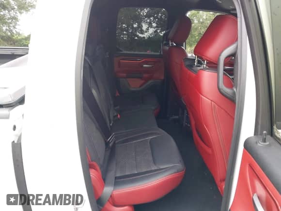 2019 Ram 1500 Rebel with VIN 1C6SRFET6KN831682, listed as a IAAI auction lot 43058692 with 96,263 mi miles and . Bid and sale history available at DreamBid. Image 8.