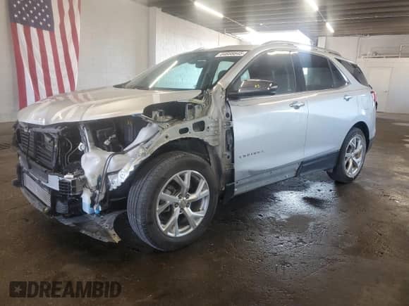 2020 Chevrolet Equinox Premier with VIN 3GNAXNEV2LS527009, listed as a Copart auction lot 64666645 with 33,470 mi miles and Salvage title. Bid and sale history available at DreamBid. Image 1.