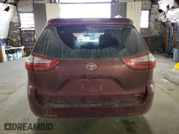 2015 Toyota Sienna LE AAS with VIN 5TDKK3DCXFS669844, listed as a Copart auction lot 80445005 with 219,688 mi miles and Salvage title. Bid and sale history available at DreamBid. Image 6.