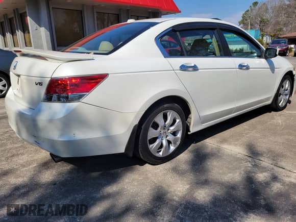 2009 Honda Accord EX-L with VIN 1HGCP36849A044437, listed as a IAAI auction lot 41705876 with 228,180 mi miles and . Bid and sale history available at DreamBid. Image 3.