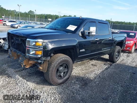 2014 Chevrolet Silverado 1500 High Country with VIN 3GCUKTEC7EG272127, listed as a IAAI auction lot 42465267 with 190,924 mi miles and . Bid and sale history available at DreamBid. Image 2.