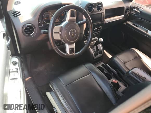 2015 Jeep Compass High Altitude with VIN 1C4NJCEA0FD178823, listed as a Copart auction lot 57904775 with 106,240 mi miles and Salvage title. Bid and sale history available at DreamBid. Image 8.