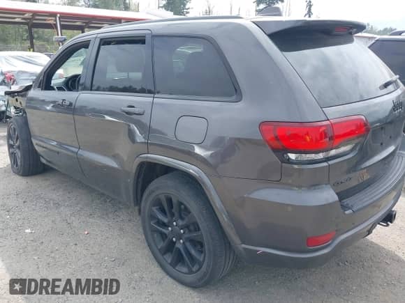 2020 Jeep Grand Cherokee Altitude z VIN 1C4RJFAG7LC211220, wystawiony jako IAAI lot #42900162 z przebiegiem 62 344 mil mil oraz . Historia ofert i sprzedaży dostępna na DreamBid. Obrazek 3.