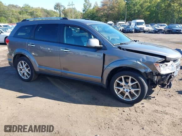2013 Dodge Journey Crew with VIN 3C4PDDDG2DT568793, listed as a IAAI auction lot 43265102 with 108,285 mi miles and . Bid and sale history available at DreamBid. Image 1.