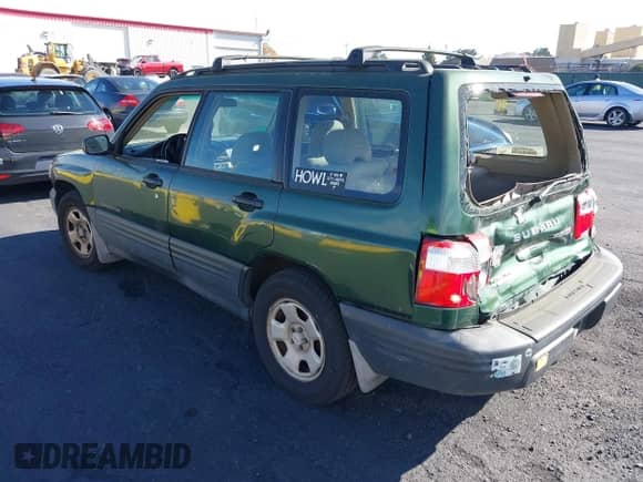 2002 Subaru Forester L with VIN JF1SF63562H735304, listed as a IAAI auction lot 43536852 with 217,134 mi miles and . Bid and sale history available at DreamBid. Image 3.