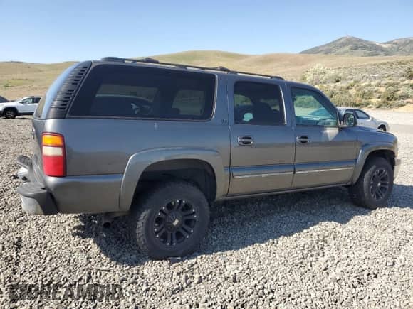 2002 Chevrolet Suburban LT z VIN 3GNGK26U22G233950, wystawiony jako Copart lot #59694795 z przebiegiem Nie podano mil oraz Czysty tytuł • Clean title. Historia ofert i sprzedaży dostępna na DreamBid. Obrazek 3.