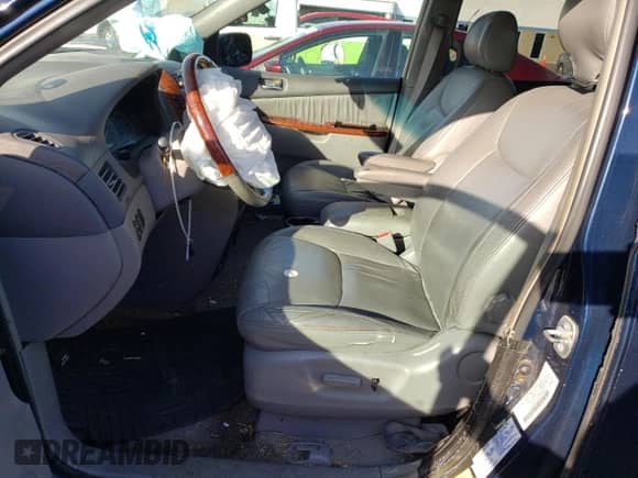 2004 Toyota Sienna XLE z VIN 5TDBA22CX4S016329, wystawiony jako Copart lot #81563145 z przebiegiem 217 337 mil mil oraz Szkoda całkowita • Salvage title. Historia ofert i sprzedaży dostępna na DreamBid. Obrazek 7.