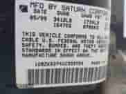 1999 Saturn SL z VIN 1G8ZK5274XZ333729, wystawiony jako IAAI lot #41987885 z przebiegiem Nie podano mil oraz . Historia ofert i sprzedaży dostępna na DreamBid. Obrazek 9.