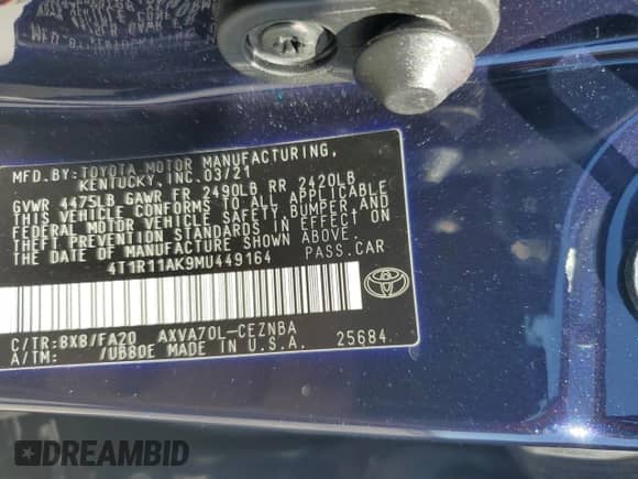 2021 Toyota Camry LE z VIN 4T1R11AK9MU449164, wystawiony jako Copart lot #84798495 z przebiegiem 15 811 mil mil oraz Szkoda całkowita • Salvage title. Historia ofert i sprzedaży dostępna na DreamBid. Obrazek 12.