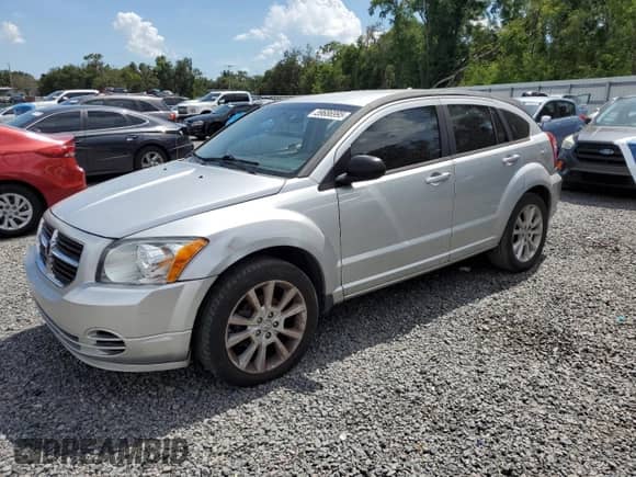 2011 Dodge Caliber Heat with VIN 1B3CB5HA4BD113240, listed as a Copart auction lot 59686995 with 222,474 mi miles and Salvage title. Bid and sale history available at DreamBid. Image 1.