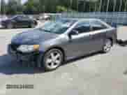 2014 Toyota Camry SE with VIN 4T1BF1FKXEU357784, listed as a Copart auction lot 82232805 with 114,424 mi miles and Salvage title. Bid and sale history available at DreamBid. Image 1.