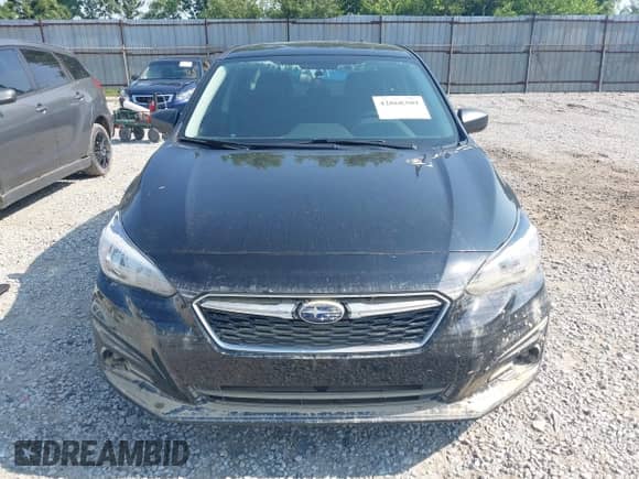 2019 Subaru Impreza with VIN 4S3GKAB60K3613799, listed as a IAAI auction lot 42868309 with 62,834 mi miles and . Bid and sale history available at DreamBid. Image 6.