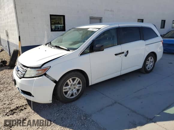 2013 Honda Odyssey LX с VIN 5FNRL5H25DB036128, выставлен на аукционе Copart как лот 81769115 с пробегом 167 079 миль миль и Чистый • Clean title. История ставок и продаж доступна на DreamBid. Изображение 1.