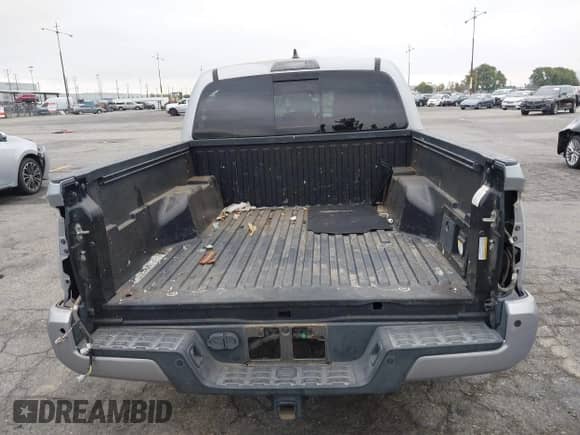 2019 Toyota Tacoma SR5 с VIN 3TMAZ5CN3KM104917, выставлен на аукционе IAAI как лот 43210298 с пробегом 136 976 миль миль и . История ставок и продаж доступна на DreamBid. Изображение 17.
