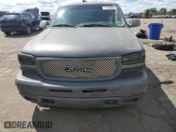 2002 GMC Sierra 1500 SL с VIN 1GTEC14V02Z275407, выставлен на аукционе Copart как лот 71104635 с пробегом 224 294 миль миль и Списание • Salvage title. История ставок и продаж доступна на DreamBid. Изображение 5.