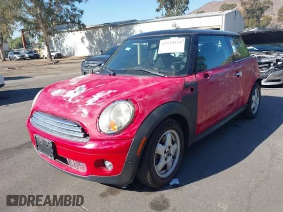 2010 MINI Hardtop with VIN WMWMF3C57ATZ63869, listed as a IAAI auction lot 43528124 with 75,782 mi miles and . Bid and sale history available at DreamBid. Image 2.