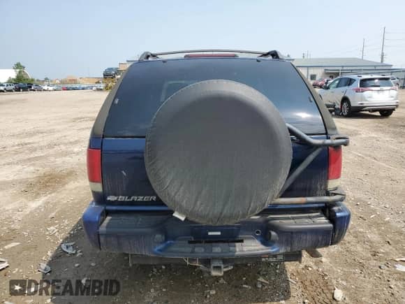 2001 Chevrolet Blazer LS z VIN 1GNCT18W01K164848, wystawiony jako Copart lot #59951705 z przebiegiem 109 273 mil mil oraz Nie do naprawy • Non repairable. Historia ofert i sprzedaży dostępna na DreamBid. Obrazek 6.