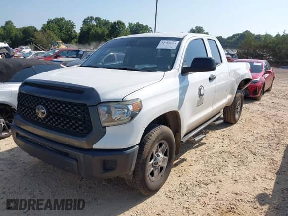 2020 Toyota Tundra SR with VIN 5TFUY5F14LX919793, listed as a IAAI auction lot 42782094 with 164,781 mi miles and . Bid and sale history available at DreamBid. Image 17.