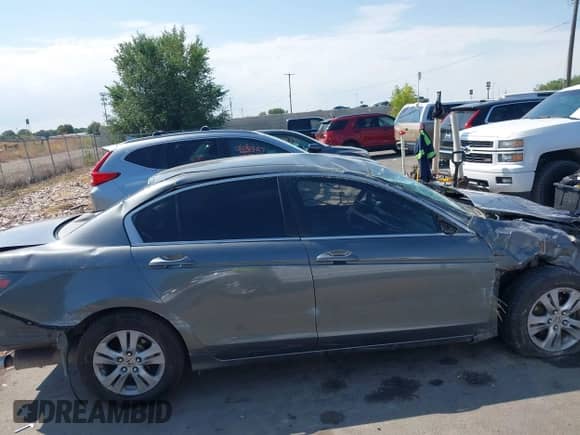 2012 Honda Accord LX Premium with VIN 1HGCP2F42CA058481, listed as a IAAI auction lot 43137433 with 215,370 mi miles and . Bid and sale history available at DreamBid. Image 13.