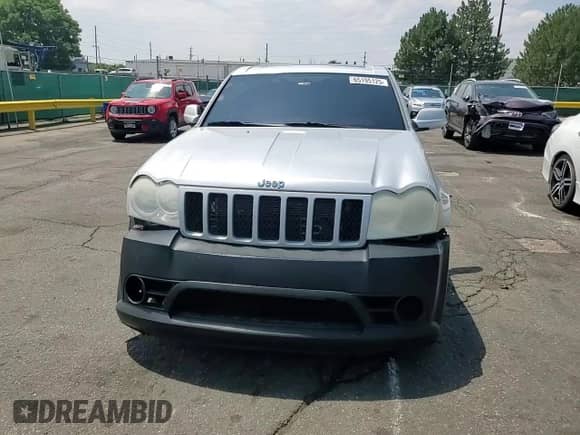 2007 Jeep Grand Cherokee SRT-8 с VIN 1J8HR78307C513119, выставлен на аукционе Copart как лот 65195125 с пробегом 255 602 миль миль и Списание • Salvage title. История ставок и продаж доступна на DreamBid. Изображение 13.
