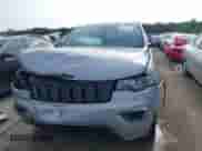 2020 Jeep Grand Cherokee Altitude with VIN 1C4RJFAG4LC116551, listed as a IAAI auction lot 43021481 with 129,650 mi miles and . Bid and sale history available at DreamBid. Image 13.