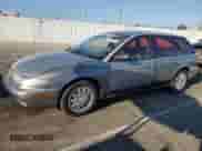 1997 Saturn SW with VIN 1G8ZK8279VZ169005, listed as a Copart auction lot 73049694 with 110,215 mi miles and Salvage title. Bid and sale history available at DreamBid. Image 1.
