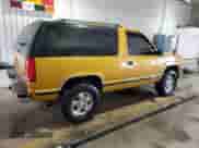 1997 Chevrolet Tahoe z VIN 3GNEK18R1VG104628, wystawiony jako Copart lot #53315215 z przebiegiem 195 743 mil mil oraz Szkoda całkowita • Salvage title. Historia ofert i sprzedaży dostępna na DreamBid. Obrazek 3.