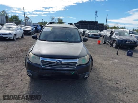 2009 Subaru Forester X with VIN JF2SH63679G732801, listed as a IAAI auction lot 43478055 with 166,758 mi miles and . Bid and sale history available at DreamBid. Image 12.