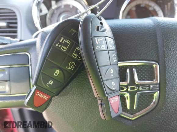 2015 Dodge Grand Caravan SXT with VIN 2C4RDGCG4FR585175, listed as a IAAI auction lot 43407444 with 104,404 mi miles and . Bid and sale history available at DreamBid. Image 11.