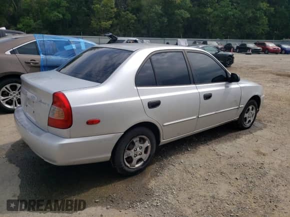 2002 Hyundai Accent GL с VIN KMHCG45C82U303831, выставлен на аукционе Copart как лот 72812574 с пробегом 126 237 миль миль и Списание • Salvage title. История ставок и продаж доступна на DreamBid. Изображение 3.