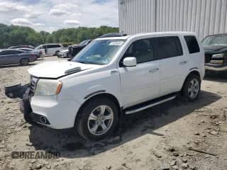 2013 Honda Pilot EX-L with VIN 5FNYF4H64DB053809, listed as a Copart auction lot 57836495 with 119,748 mi miles and Salvage title. Bid and sale history available at DreamBid. Image 1.