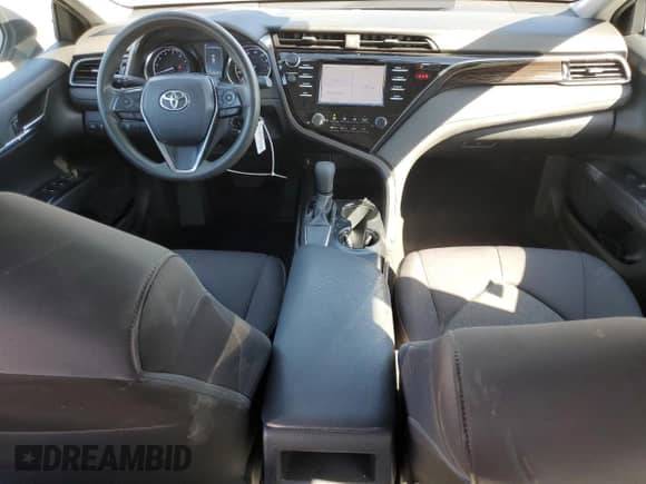 2019 Toyota Camry LE с VIN 4T1B11HKXKU821888, выставлен на аукционе Copart как лот 86159375 с пробегом 64 469 миль миль и Списание • Salvage title. История ставок и продаж доступна на DreamBid. Изображение 8.