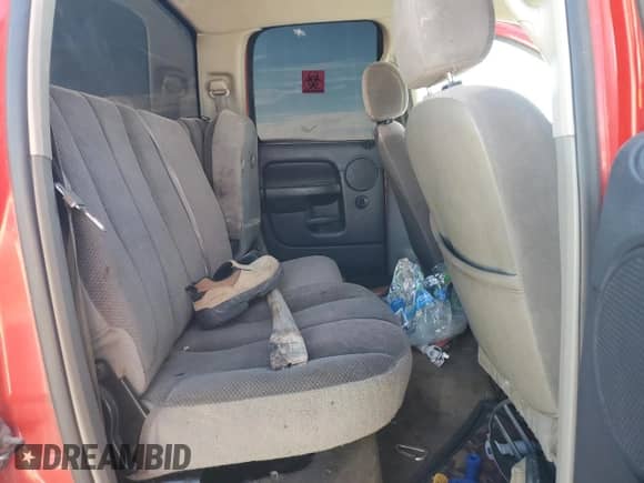2002 Dodge RAM with VIN 1B7HA18N72J102611, listed as a Copart auction lot 82177684 with 262,766 mi miles and Salvage title. Bid and sale history available at DreamBid. Image 9.