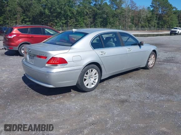 2002 BMW 7 Series 745Li z VIN WBAGN63422DR03759, wystawiony jako IAAI lot #42822104 z przebiegiem 88 317 mil mil oraz . Historia ofert i sprzedaży dostępna na DreamBid. Obrazek 4.