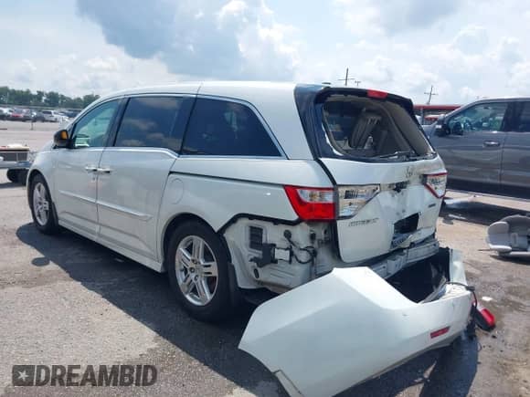 2012 Honda Odyssey Touring с VIN 5FNRL5H99CB115300, выставлен на аукционе IAAI как лот 42890660 с пробегом 120 808 миль миль и . История ставок и продаж доступна на DreamBid. Изображение 3.