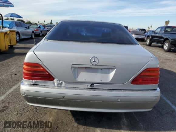 1993 Mercedes-Benz 500 с VIN WDBGA70E2PA135256, выставлен на аукционе Copart как лот 85974174 с пробегом 66 101 миль миль и Списание • Salvage title. История ставок и продаж доступна на DreamBid. Изображение 6.