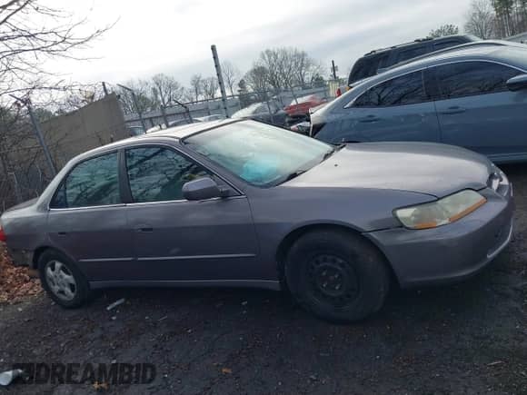 2000 Honda Accord EX with VIN 1HGCG5651YA129056, listed as a IAAI auction lot 41532787 with Not provided miles and . Bid and sale history available at DreamBid. Image 13.