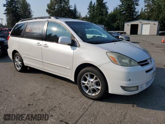 2004 Toyota Sienna XLE z VIN 5TDBA22C74S018541, wystawiony jako Copart lot #82137955 z przebiegiem 160 277 mil mil oraz Szkoda całkowita • Salvage title. Historia ofert i sprzedaży dostępna na DreamBid. Obrazek 4.