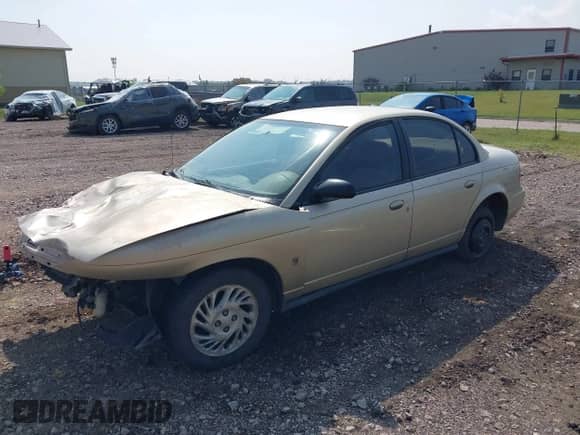 1998 Saturn SL with VIN 1G8ZJ5270WZ203979, listed as a IAAI auction lot 43135380 with 212,673 mi miles and . Bid and sale history available at DreamBid. Image 2.