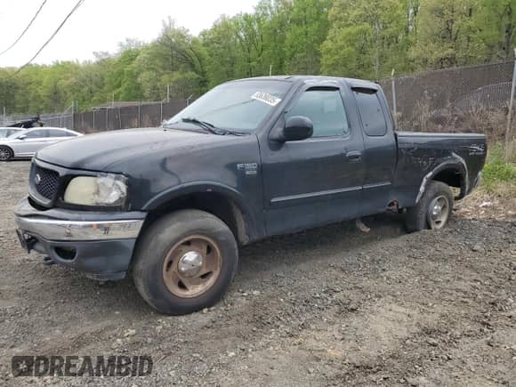 2000 Ford F-150 XL with VIN 1FTRX18W0YNC08668, listed as a Copart auction lot 53636035 with Not provided miles and Salvage title. Bid and sale history available at DreamBid. Image 1.