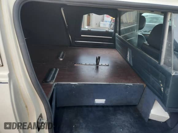 2006 Cadillac DTS Professional with VIN 1GEEH06Y36U500285, listed as a Copart auction lot 66305425 with 122,220 mi miles and Salvage title. Bid and sale history available at DreamBid. Image 10.